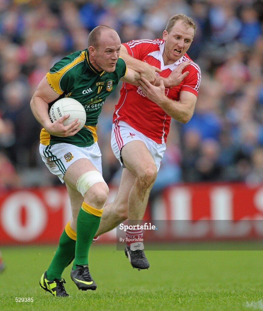 25 June 2011; Joe Sheridan, Meath, in action against Aaron Hoey, Louth. GAA Football All-Ireland Senior Championship Qualifier Round 1, Louth v Meath, Kingspan Breffni Park, Co. Cavan. Photo by Sportsfile