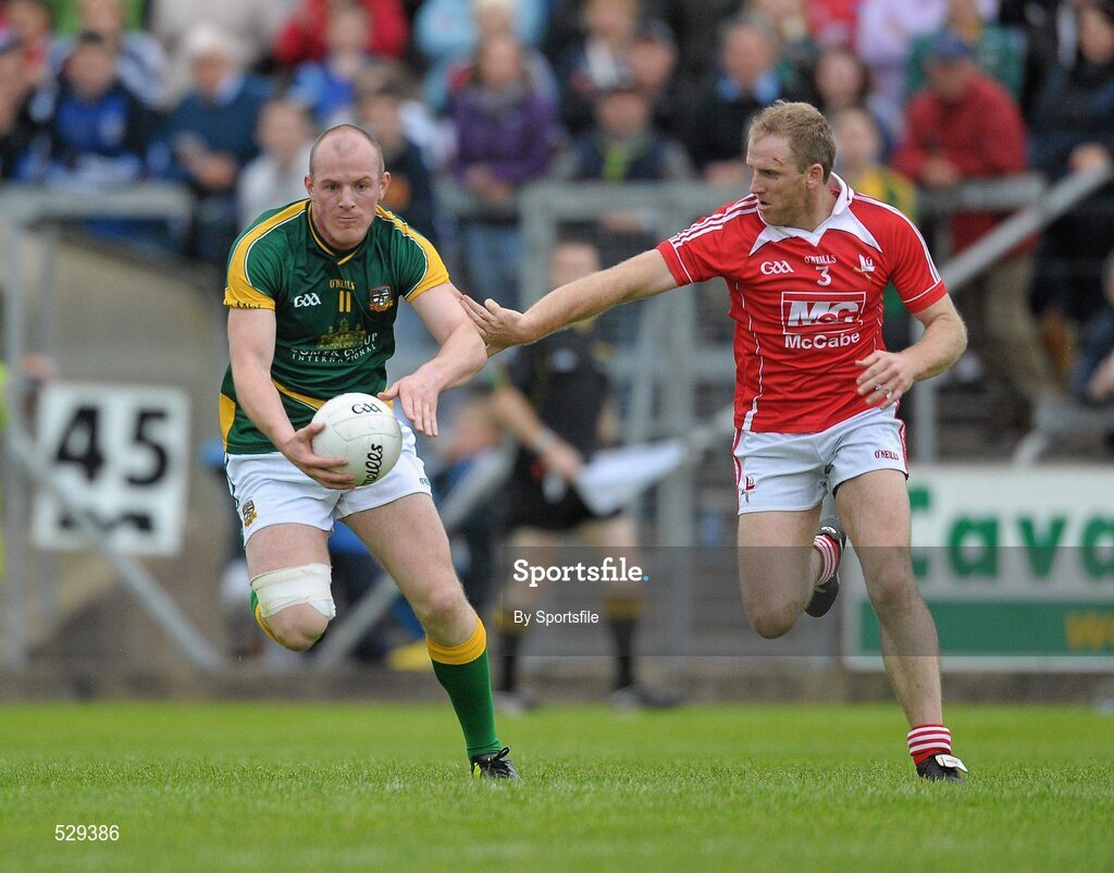 25 June 2011; Joe Sheridan, Meath, in action against Aaron Hoey, Louth. GAA Football All-Ireland Senior Championship Qualifier Round 1, Louth v Meath, Kingspan Breffni Park, Co. Cavan. Photo by Sportsfile