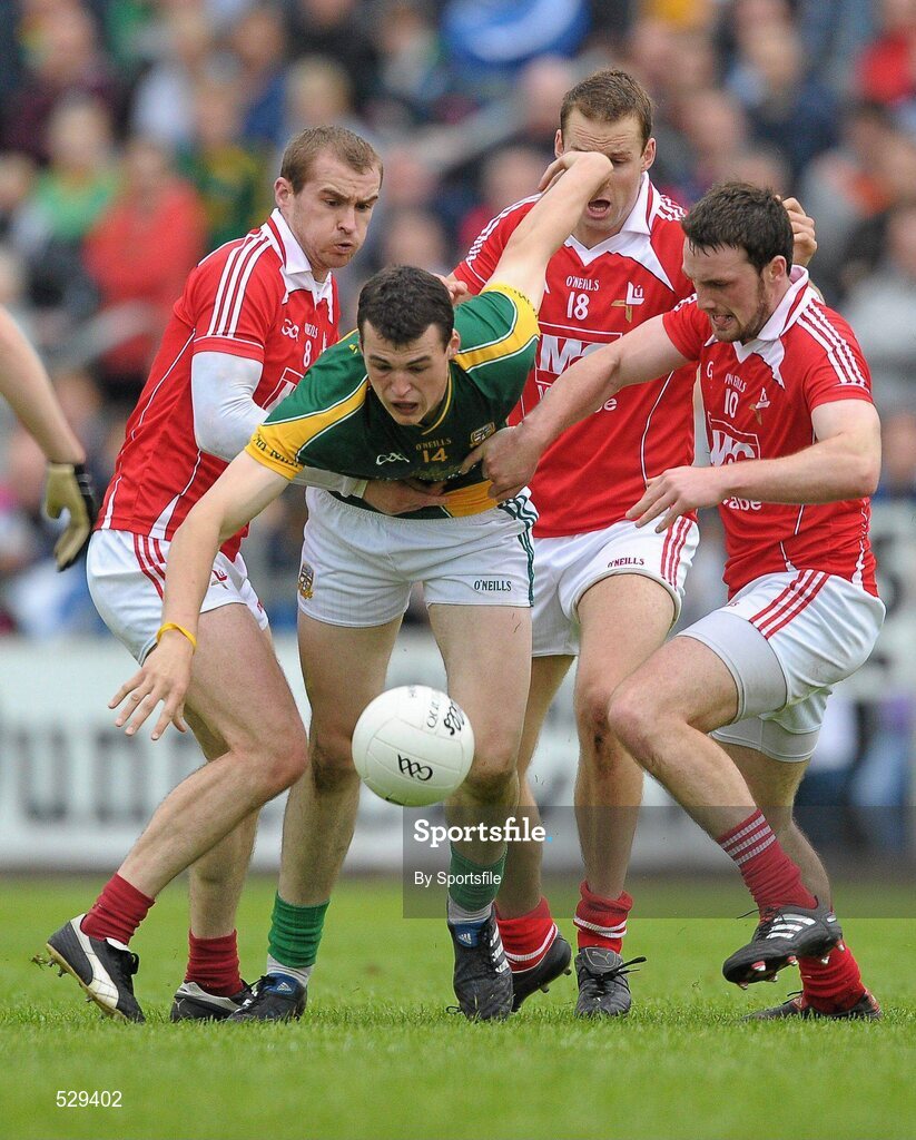 25 June 2011; Paddy O'Rourke, Meath, in action against Paddy Keenan, left, Michael Fanning and Derek Crilly, right, Louth. GAA Football All-Ireland Senior Championship Qualifier Round 1, Louth v Meath, Kingspan Breffni Park, Co. Cavan. Photo by Sportsfile