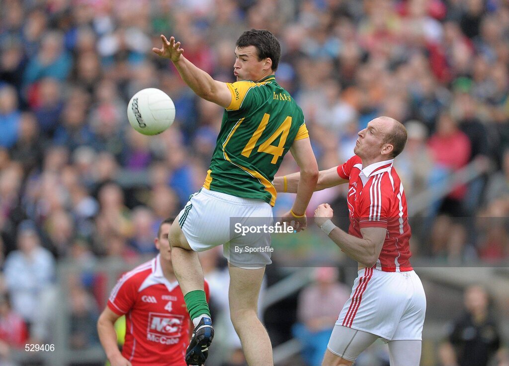 25 June 2011; Paddy O'Rourke, Meath, in action against Eamonn McAuley, Louth. GAA Football All-Ireland Senior Championship Qualifier Round 1, Louth v Meath, Kingspan Breffni Park, Co. Cavan. Photo by Sportsfile