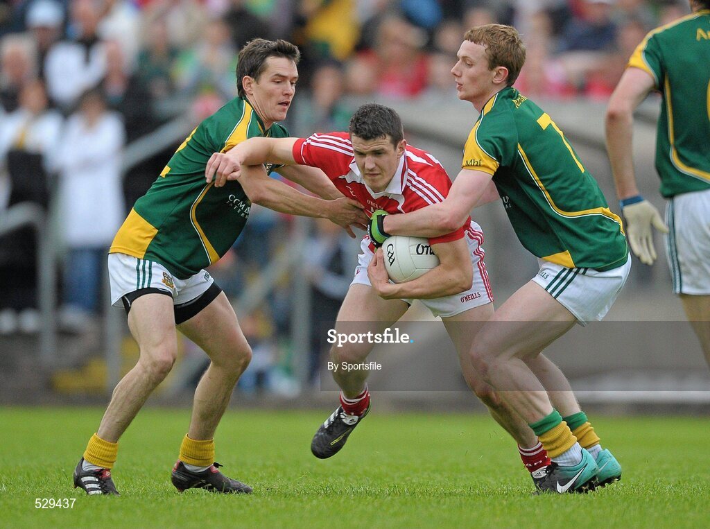 25 June 2011; Adrian Reid, Louth, in action against Seamus Kenny, left, and Ciaran Lenehan, Meath. GAA Football All-Ireland Senior Championship Qualifier Round 1, Louth v Meath, Kingspan Breffni Park, Co. Cavan. Photo by Sportsfile