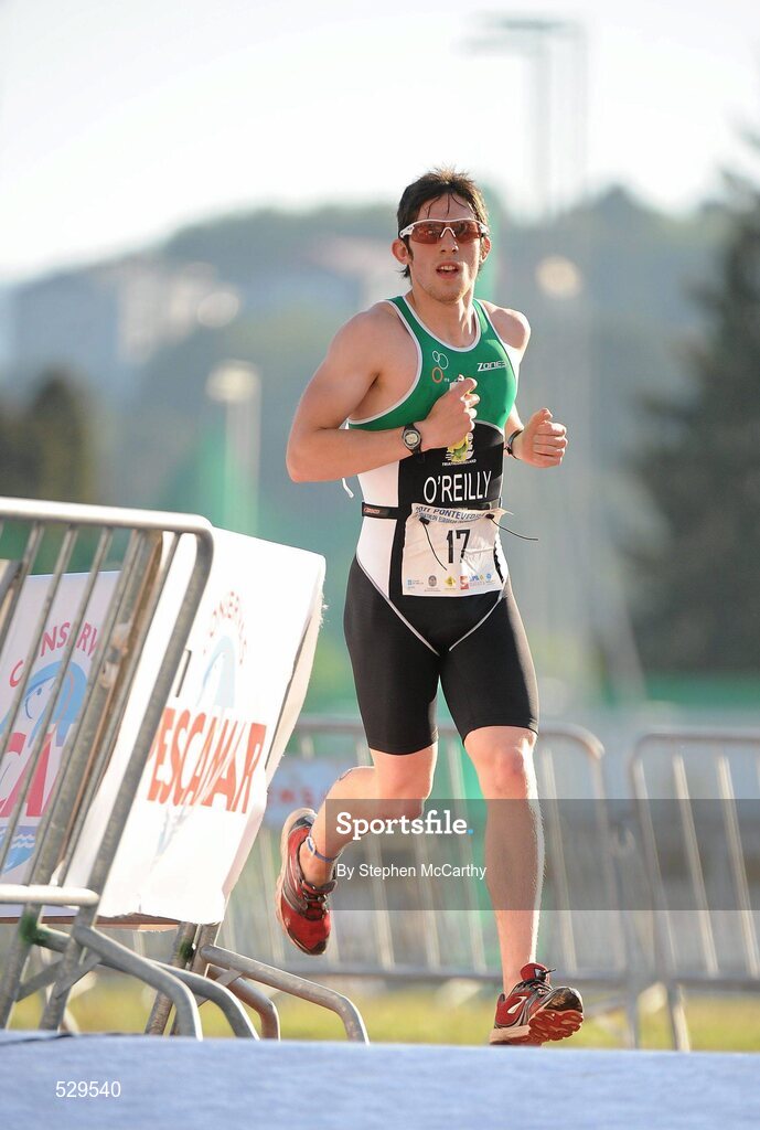 25 June 2011; Ireland's Jack O'Reilly, from Enniskillen, Co. Fermanagh, on his way to taking 6th position in the 20-24 Male Age Group Sprint event, with a time of 01:09:40, at the 2011 Pontevedra ETU Triathlon European Championships. Pontevedra, Spain. Picture credit: Stephen McCarthy / SPORTSFILE