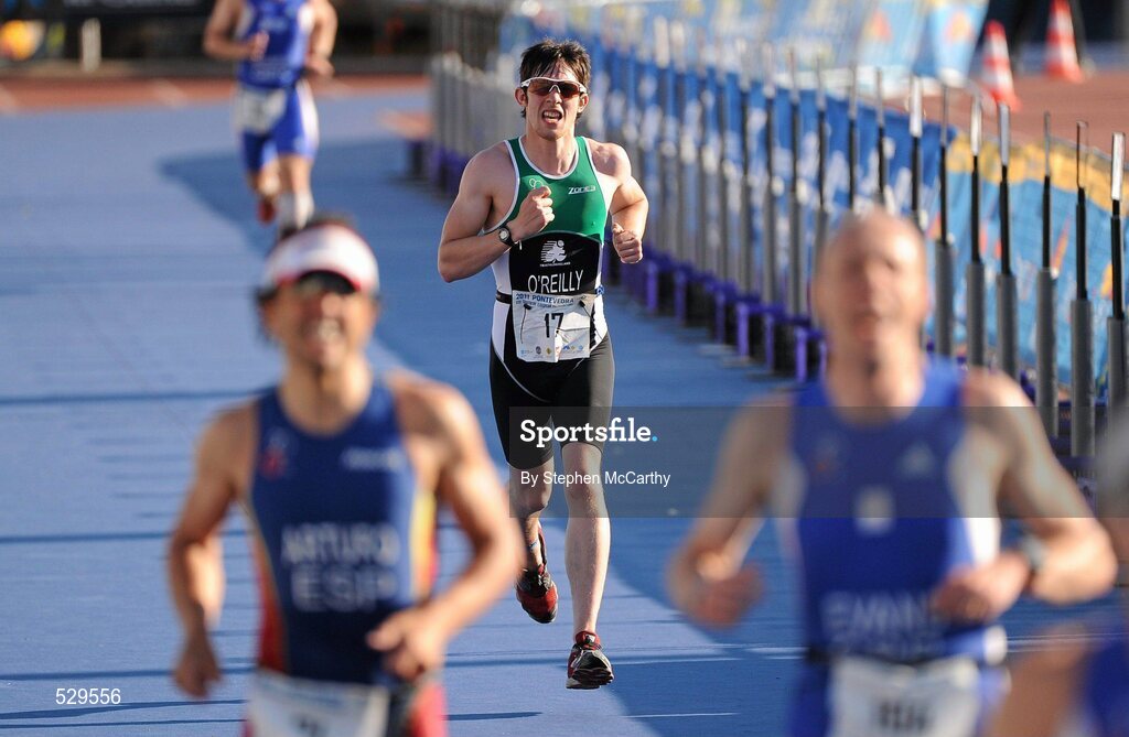 25 June 2011; Ireland's Jack O'Reilly, from Enniskillen, Co. Fermanagh, on his way to taking 6th position in the 20-24 Male Age Group Sprint event, with a time of 01:09:40, at the 2011 Pontevedra ETU Triathlon European Championships. Pontevedra, Spain. Picture credit: Stephen McCarthy / SPORTSFILE