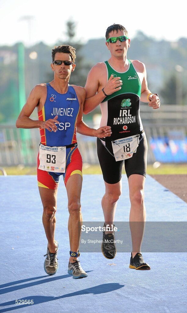 25 June 2011; Ireland's Ian Richardson, from Higginstown, Slane, Co. Meath, tussles with Jesús Jiménez Fueyo, Spain, for position, on his way to taking 5th position in the 20-24 Male Age Group Sprint event, with a time of 01:09:07, at the 2011 Pontevedra ETU Triathlon European Championships. Pontevedra, Spain. Picture credit: Stephen McCarthy / SPORTSFILE