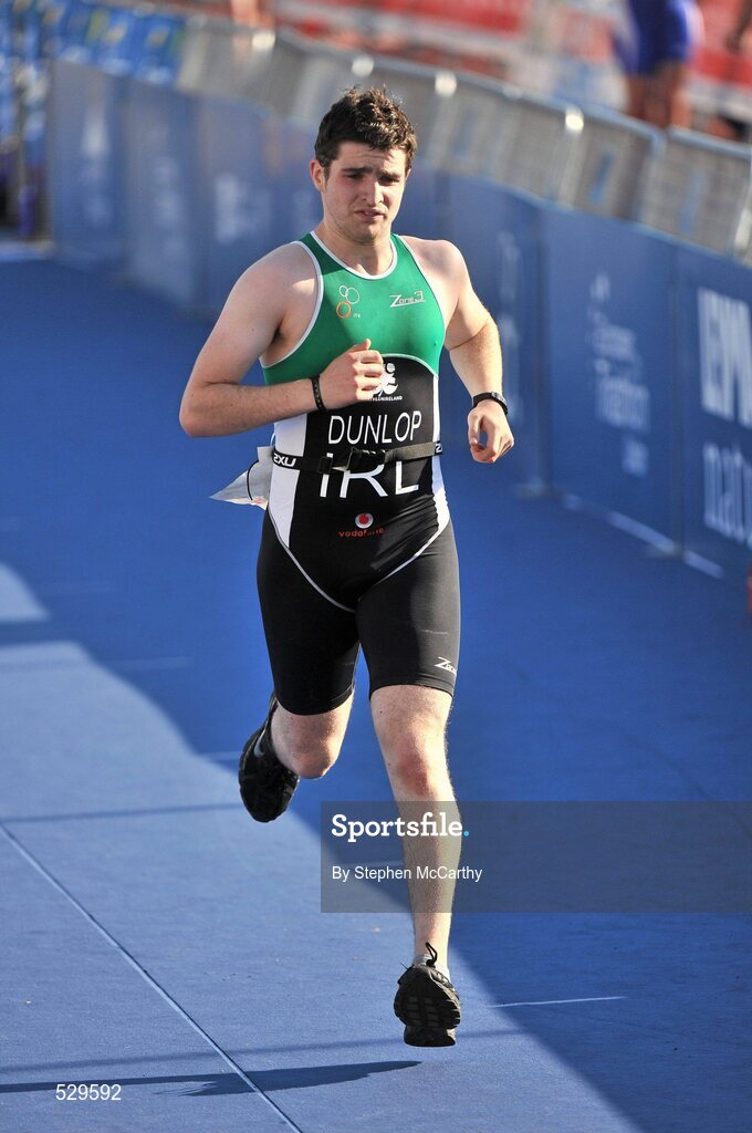 25 June 2011; Ireland's Martin Dunlop, from Derry, on his way to taking 10th position in the 20-24 Male Age Group Sprint event, with a time of 01:23:48, at the 2011 Pontevedra ETU Triathlon European Championships. Pontevedra, Spain. Picture credit: Stephen McCarthy / SPORTSFILE