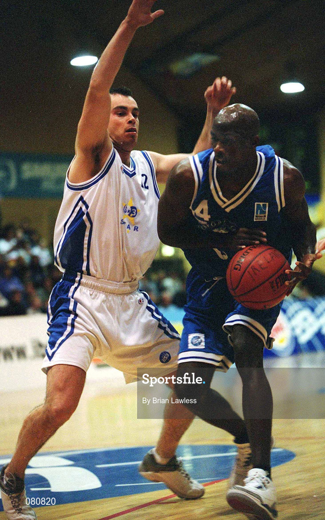 25 January 2002; James Singleton of Waterford Crystal in action against Gary Connolly of SX3 Star during the ESB Men's National Cup Semi-Final match between Waterford Crystal and SX3 Star at the ESB Arena in Tallaght, Dublin. Photo by Brian Lawless/Sportsfile