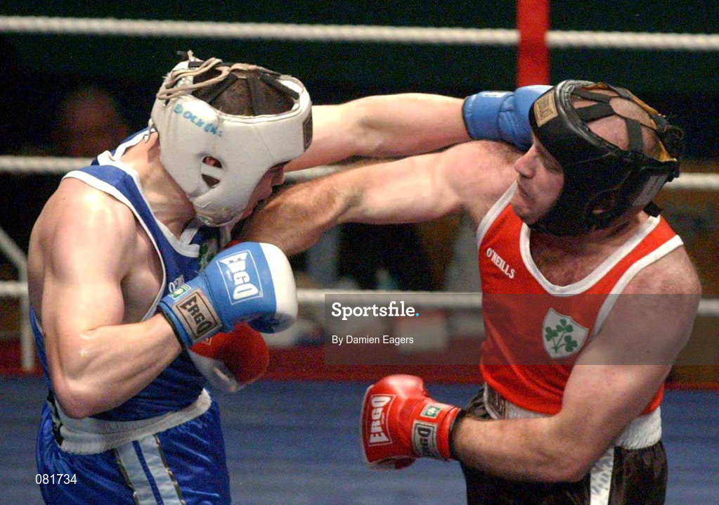 22 February 2002; Cathal McMonagle, left, in action against Eanna Falvey during the Super Heavyweight Final between Eanna Falvey and Cathal McMonagle during the National Senior Boxing Championships at the The National Stadium in Dublin. Photo by Damien Eagers/Sportsfile