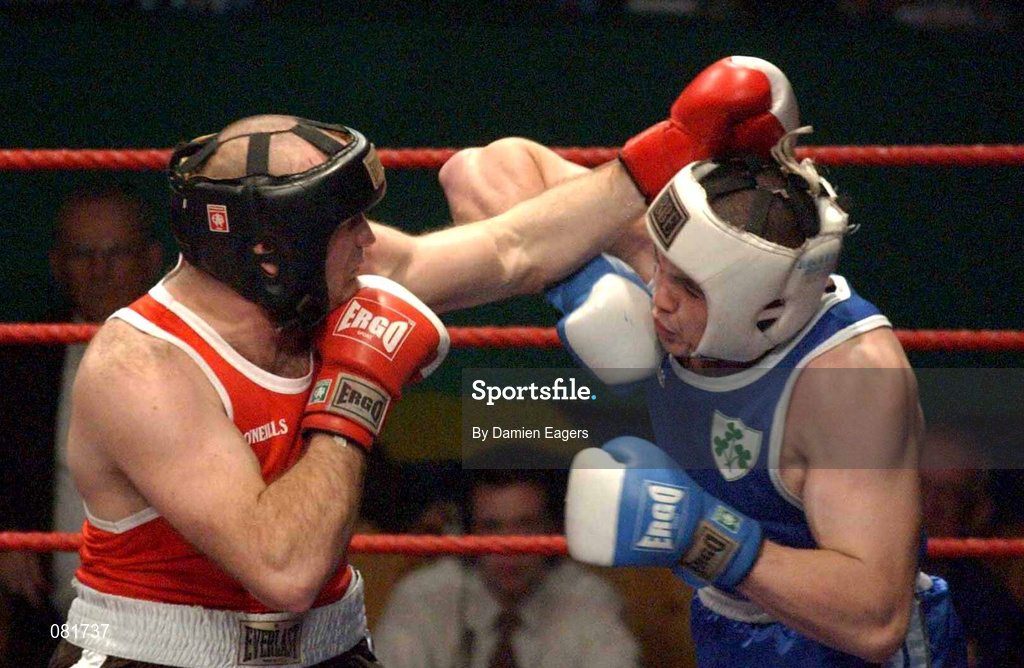 22 February 2002; Cathal McMonagle, right, in action against Eanna Falvey during the Super Heavyweight Final between Eanna Falvey and Cathal McMonagle during the National Senior Boxing Championships at the The National Stadium in Dublin. Photo by Damien Eagers/Sportsfile