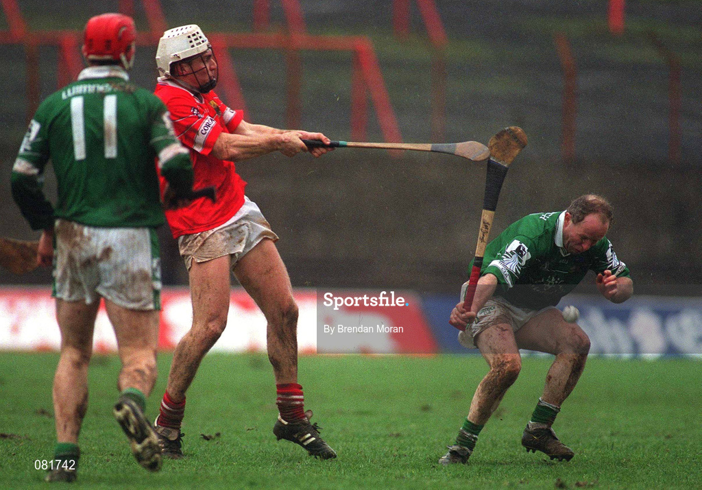 25 February 2002; Timmy McCarthy of Cork has his shot blocked by Stephen McDonagh of Limerick during the Allianz National Hurling League Division 1B Round 1 match between Limerick and Cork at the Gaelic Grounds in Limerick. Photo by Brendan Moran/Sportsfile