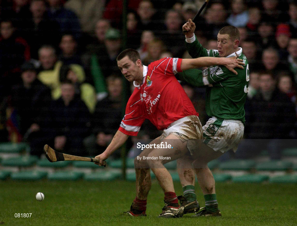 25 February 2002; Alan Cummins of Cork in action against Ciaran Carey of Limerick during the Allianz National Hurling League Division 1B Round 1 match between Limerick and Cork at the Gaelic Grounds in Limerick. Photo by Brendan Moran/Sportsfile