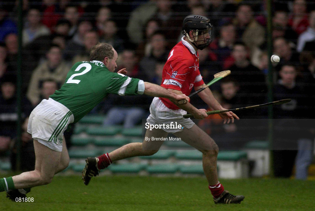 245 February 2002; Ben O'Connor of Cork, in action against Stephen McDonagh of Limerick during the Allianz National Hurling League Division 1B Round 1 match between Limerick and Cork at the Gaelic Grounds in Limerick. Photo by Brendan Moran/Sportsfile