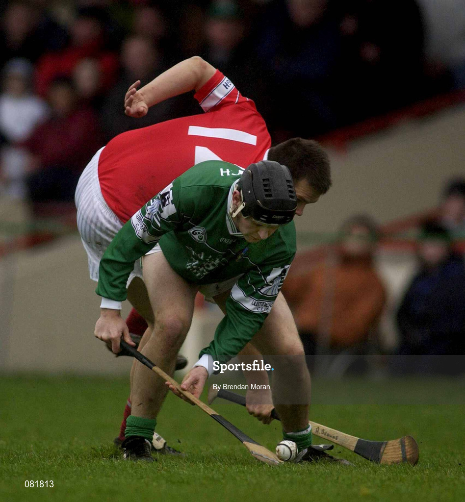 25 February 2002; TJ Ryan of Limerick in action against Alan Browne of Cork during the Allianz National Hurling League Division 1B Round 1 match between Limerick and Cork at the Gaelic Grounds in Limerick. Photo by Brendan Moran/Sportsfile