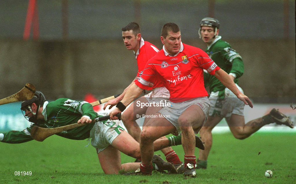 25 February 2002; Diarmuid O'Sullivan of Cork, attempts to get possession ahead of Owen Foley of Limerick during the Allianz National Hurling League Division 1B Round 1 match between Limerick and Cork at the Gaelic Grounds in Limerick. Photo by Brendan Moran/Sportsfile