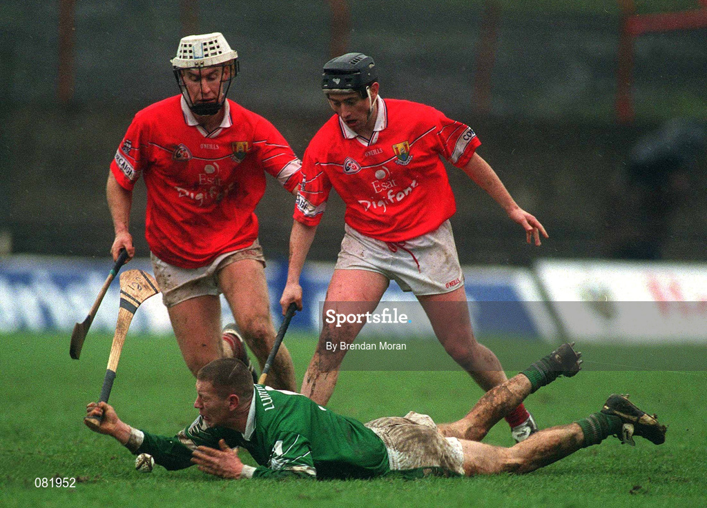 25 February 2002; Ciaran Carey of Limerick, in action against Timmy McCarthy, left, and Pat Ryan, both of Cork, during the Allianz National Hurling League Division 1B Round 1 match between Limerick and Cork at the Gaelic Grounds in Limerick. Photo by Brendan Moran/Sportsfile