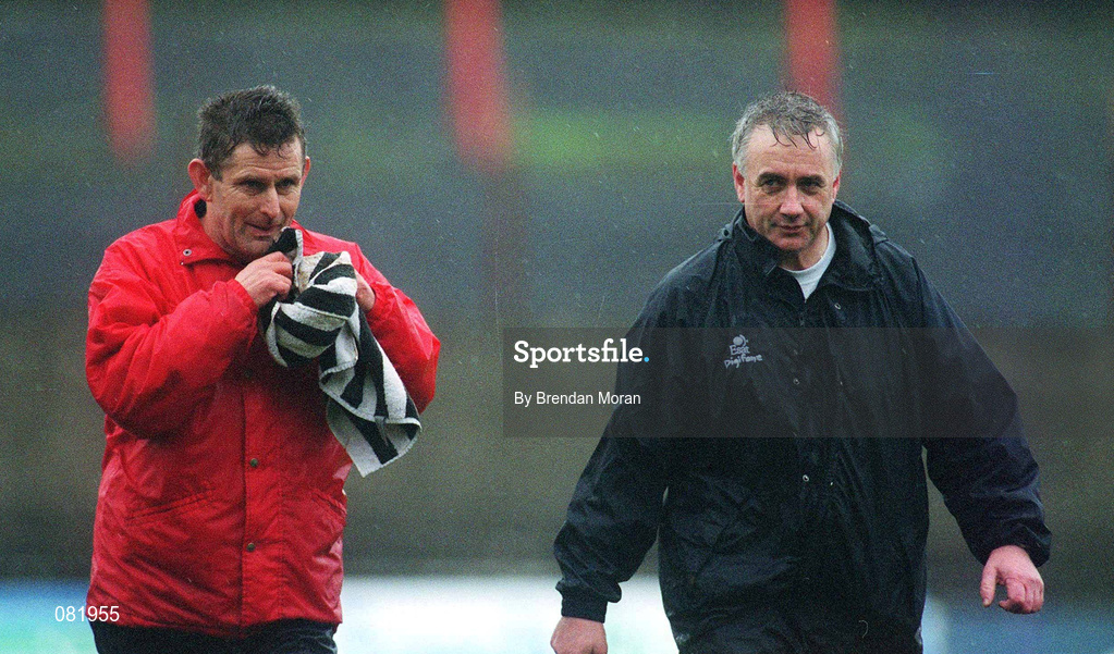 25 February 2002; Cork Trainer Teddy Owens, left, leaves the field after the game with Manager Bertie Og Murphy following the Allianz National Hurling League Division 1B Round 1 match between Limerick and Cork at the Gaelic Grounds in Limerick. Photo by Brendan Moran/Sportsfile