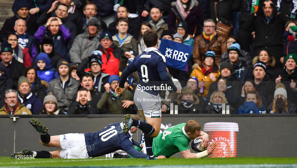 4 February 2017; Keith Earls of Ireland skips past Finn Russell, left, and Greig Laidlaw of Scotland to score Ireland's first try during the RBS Six Nations Rugby Championship match between Scotland and Ireland at BT Murrayfield Stadium in Edinburgh, Scotland. Photo by Brendan Moran/Sportsfile