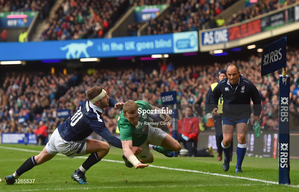 4 February 2017; Keith Earls of Ireland goes over to score his side's first try despite the tackle of Finn Russell of Scotland during the RBS Six Nations Rugby Championship match between Scotland and Ireland at BT Murrayfield Stadium in Edinburgh, Scotland. Photo by Ramsey Cardy/Sportsfile