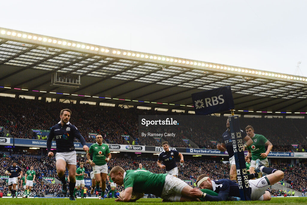 4 February 2017; Keith Earls of Ireland goes over to score his side's first try despite the tackle of Finn Russell of Scotland during the RBS Six Nations Rugby Championship match between Scotland and Ireland at BT Murrayfield Stadium in Edinburgh, Scotland. Photo by Ramsey Cardy/Sportsfile