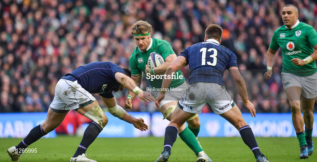4 February 2017; Jamie Heaslip of Ireland is tackled by Alex Dunbar, left, and Huw Jones of Scotland during the RBS Six Nations Rugby Championship match between Scotland and Ireland at BT Murrayfield Stadium in Edinburgh, Scotland. Photo by Brendan Moran/Sportsfile