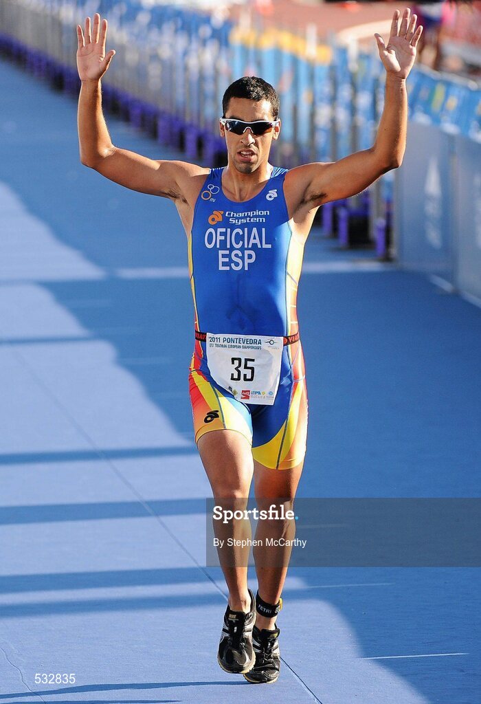 25 June 2011; Oficial Francisco, Spain, in action during the Group Sprint event. 2011 Pontevedra ETU Triathlon European Championships. Pontevedra, Spain. Picture credit: Stephen McCarthy / SPORTSFILE