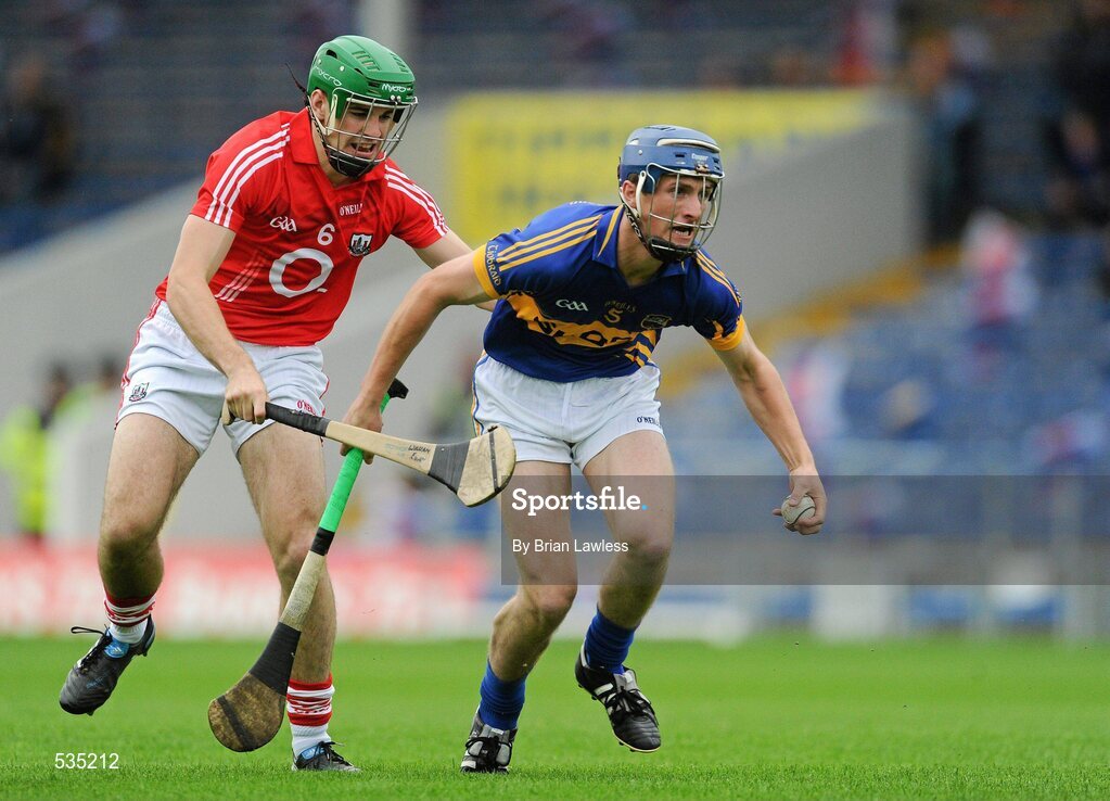 15 July 2011; Brian Stapleton, Tipperary, in action against William Egan, Cork. Bord Gáis Energy Munster GAA Hurling Under 21 Championship Semi-Final, Tipperary v Cork, Semple Stadium, Thurles, Co. Tipperary. Picture credit: Brian Lawless / SPORTSFILE