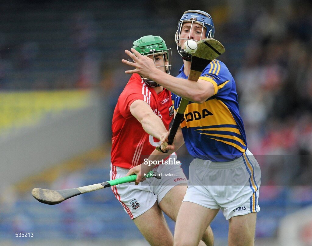 15 July 2011; Brian Stapleton, Tipperary, in action against William Egan, Cork. Bord Gáis Energy Munster GAA Hurling Under 21 Championship Semi-Final, Tipperary v Cork, Semple Stadium, Thurles, Co. Tipperary. Picture credit: Brian Lawless / SPORTSFILE