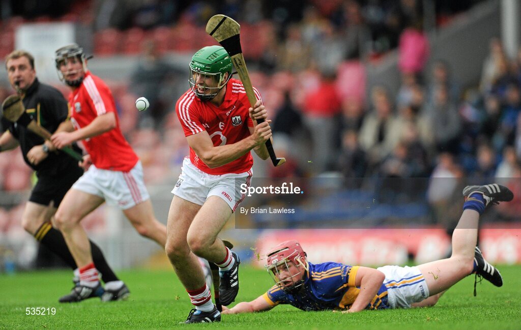 15 July 2011; William Egan, Cork, in action against Kieran Morris, Tipperary. Bord Gáis Energy Munster GAA Hurling Under 21 Championship Semi-Final, Tipperary v Cork, Semple Stadium, Thurles, Co. Tipperary. Picture credit: Brian Lawless / SPORTSFILE