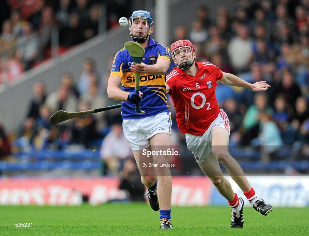 15 July 2011; Paddy Murphy, Tipperary, in action against James Nagle, Cork. Bord Gáis Energy Munster GAA Hurling Under 21 Championship Semi-Final, Tipperary v Cork, Semple Stadium, Thurles, Co. Tipperary. Picture credit: Brian Lawless / SPORTSFILE