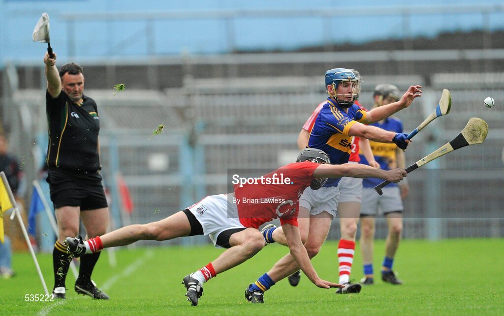 15 July 2011; Paddy Murphy, Tipperary, in action against Mark Ellis, Cork. Bord Gáis Energy Munster GAA Hurling Under 21 Championship Semi-Final, Tipperary v Cork, Semple Stadium, Thurles, Co. Tipperary. Picture credit: Brian Lawless / SPORTSFILE