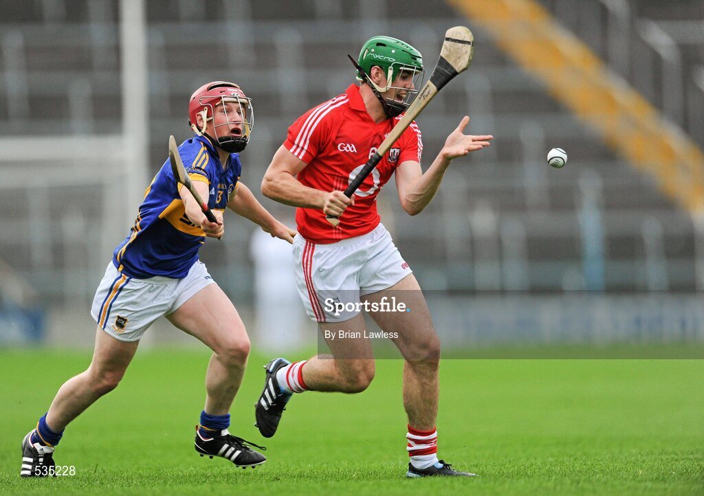 15 July 2011; William Egan, Cork, in action against Kieran Morris, Tipperary. Bord Gáis Energy Munster GAA Hurling Under 21 Championship Semi-Final, Tipperary v Cork, Semple Stadium, Thurles, Co. Tipperary. Picture credit: Brian Lawless / SPORTSFILE