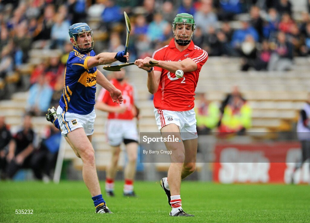15 July 2011; Aidan Walsh, Cork, in action against Paddy Murphy, Tipperary. Bord Gáis Energy Munster GAA Hurling Under 21 Championship Semi-Final, Tipperary v Cork, Semple Stadium, Thurles, Co. Tipperary. Picture credit: Barry Cregg / SPORTSFILE