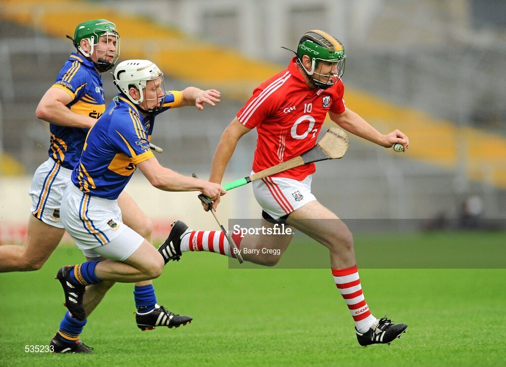 15 July 2011; Dean Brosnan, Cork, in action against Sean O'Brien, centre, and Paddy Murphy, left, Tipperary. Bord Gáis Energy Munster GAA Hurling Under 21 Championship Semi-Final, Tipperary v Cork, Semple Stadium, Thurles, Co. Tipperary. Picture credit: Barry Cregg / SPORTSFILE