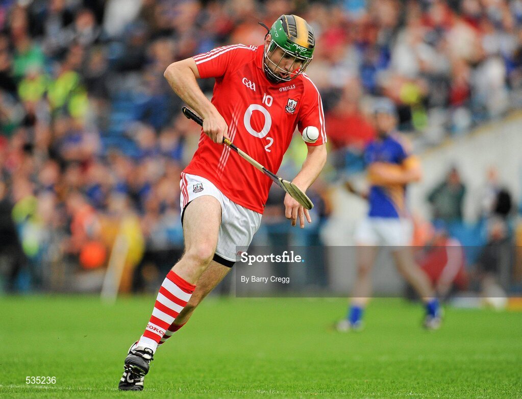 15 July 2011; Dean Brosnan, Cork, flicks the ball with his hurley on his way to scoring his side's second goal of the game. Bord Gáis Energy Munster GAA Hurling Under 21 Championship Semi-Final, Tipperary v Cork, Semple Stadium, Thurles, Co. Tipperary. Picture credit: Barry Cregg / SPORTSFILE