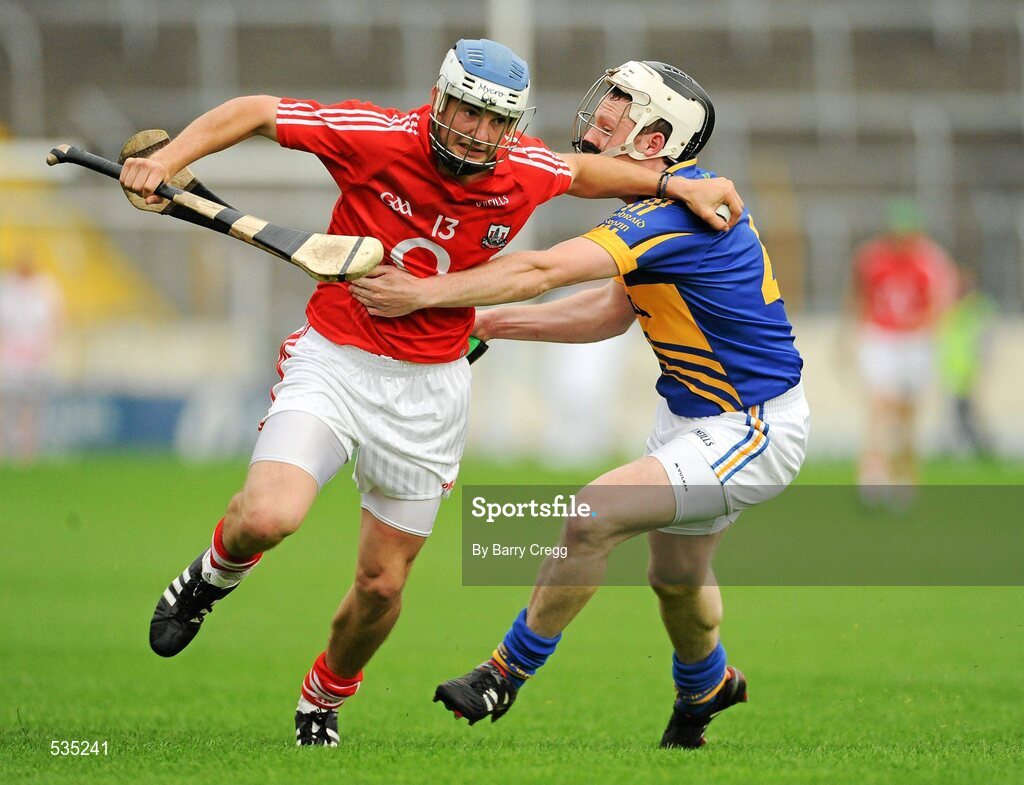 15 July 2011; Luke Farrell, Cork, in action against Sean O'Brien, Tipperary. Bord Gáis Energy Munster GAA Hurling Under 21 Championship Semi-Final, Tipperary v Cork, Semple Stadium, Thurles, Co. Tipperary. Picture credit: Barry Cregg / SPORTSFILE