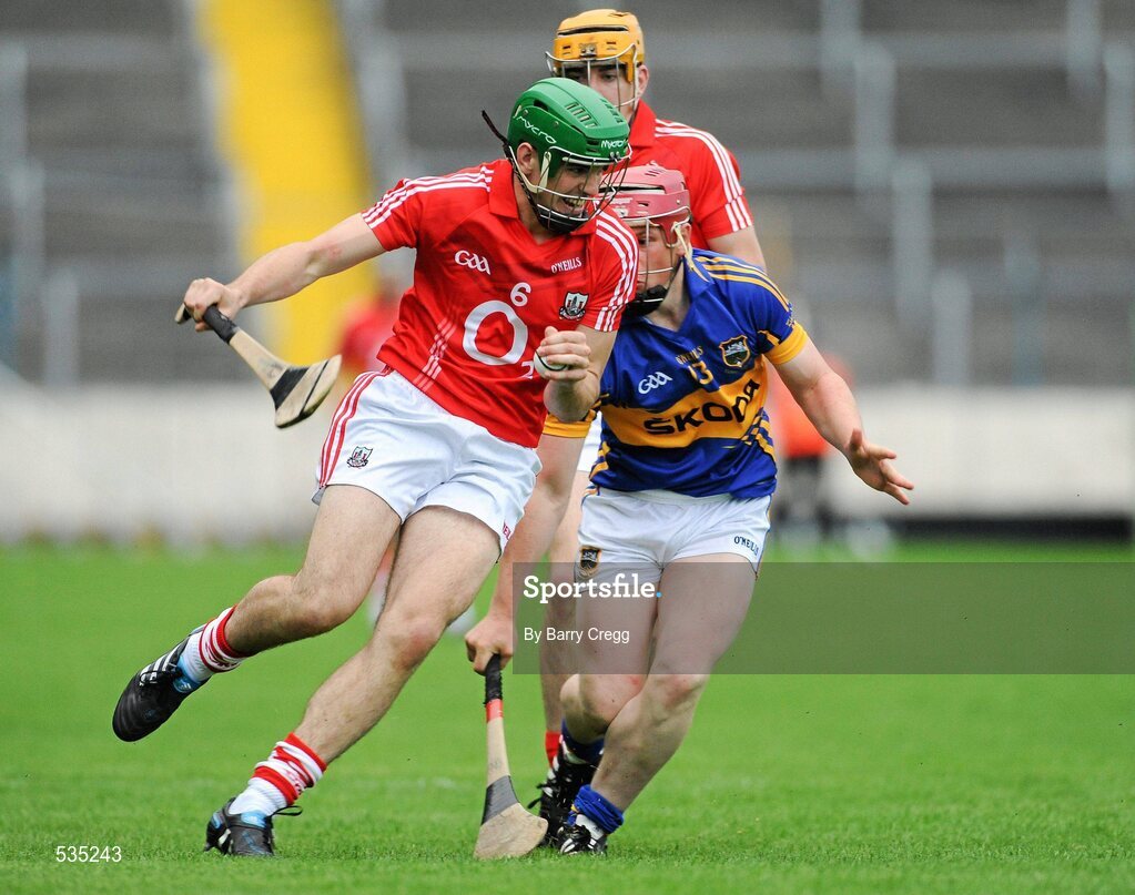 15 July 2011; William Egan, Cork, in action against Kieran Morris, Tipperary. Bord Gáis Energy Munster GAA Hurling Under 21 Championship Semi-Final, Tipperary v Cork, Semple Stadium, Thurles, Co. Tipperary. Picture credit: Barry Cregg / SPORTSFILE