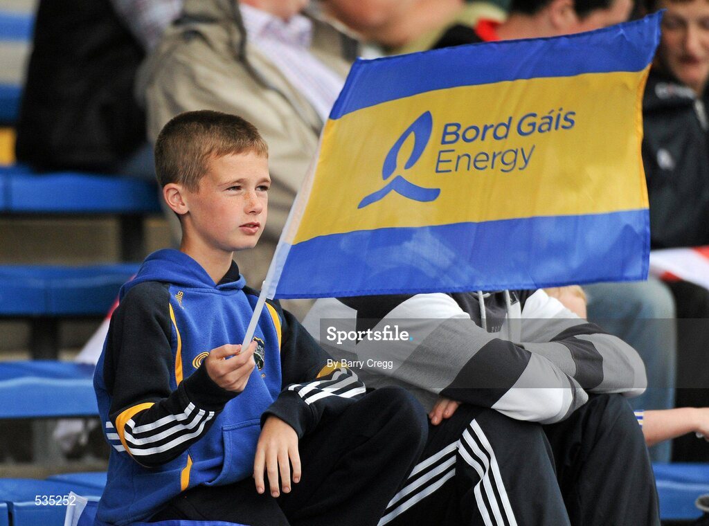 15 July 2011; A young Tipperary supporter waves his flag during the game. Bord Gáis Energy Munster GAA Hurling Under 21 Championship Semi-Final, Tipperary v Cork, Semple Stadium, Thurles, Co. Tipperary. Picture credit: Barry Cregg / SPORTSFILE