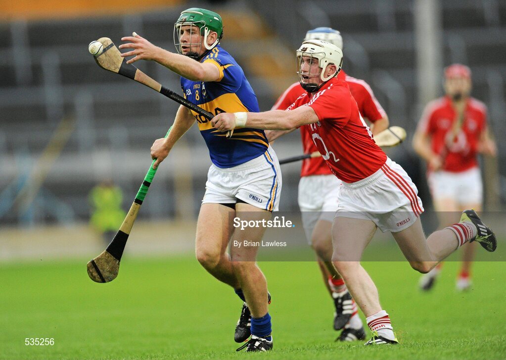 15 July 2011; Noel McGrath, Tipperary, in action against Michael O'Sullivan, Cork. Bord Gáis Energy Munster GAA Hurling Under 21 Championship Semi-Final, Tipperary v Cork, Semple Stadium, Thurles, Co. Tipperary. Picture credit: Brian Lawless / SPORTSFILE