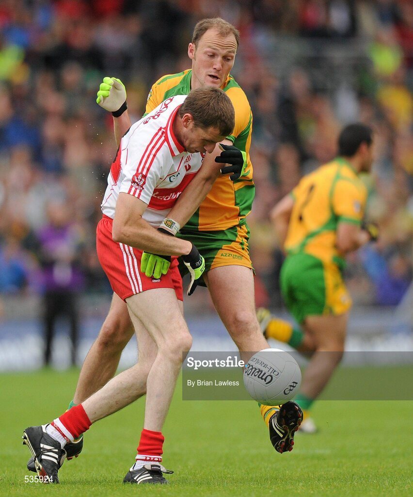 17 July 2011; Enda Muldoon, Derry, in action against Colm McFadden, Donegal. Ulster GAA Football Senior Championship Final, Derry v Donegal, St Tiernach's Park, Clones, Co. Monaghan. Picture credit: Brian Lawless / SPORTSFILE
