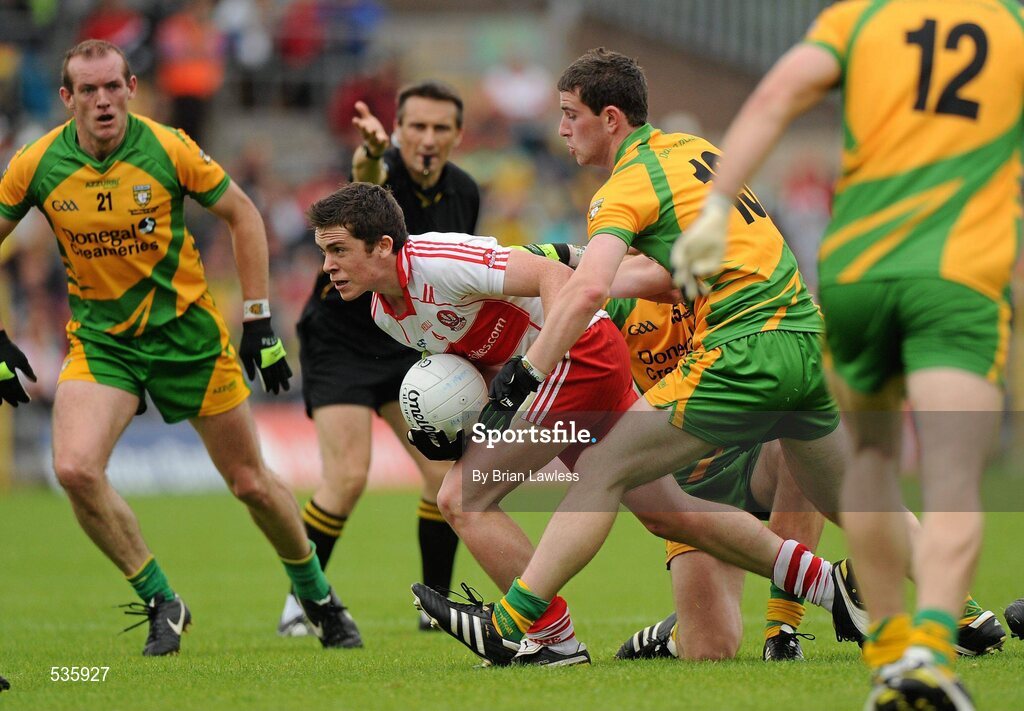 17 July 2011; Dermot McBride, Derry, in action against Patrick McBrearty, Donegal. Ulster GAA Football Senior Championship Final, Derry v Donegal, St Tiernach's Park, Clones, Co. Monaghan. Picture credit: Brian Lawless / SPORTSFILE