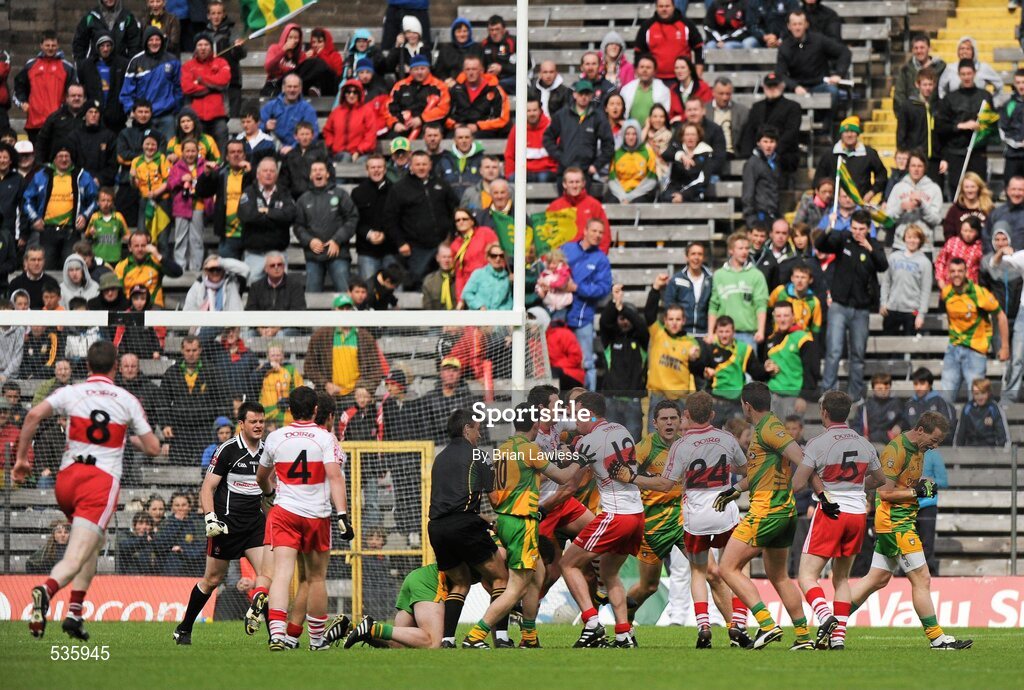 17 July 2011; Players from both teams clash during the second half. Ulster GAA Football Senior Championship Final, Derry v Donegal, St Tiernach's Park, Clones, Co. Monaghan. Picture credit: Brian Lawless / SPORTSFILE