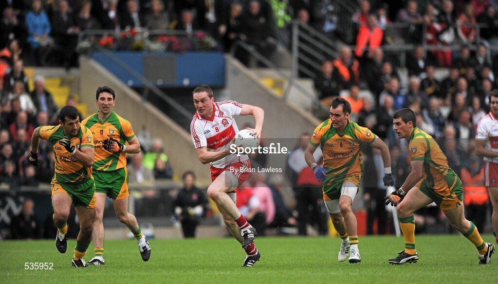 17 July 2011; Joe Diver, Derry, in action against, from left, Frank McGlynn, Michael Hegarty, Karl Lacey, and Paddy McGrath, Donegal. Ulster GAA Football Senior Championship Final, Derry v Donegal, St Tiernach's Park, Clones, Co. Monaghan. Picture credit: Brian Lawless / SPORTSFILE