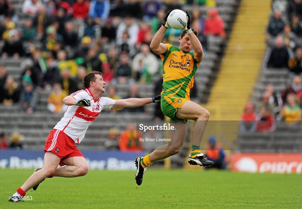 17 July 2011; Ryan Bradley, Donegal, in action against Barry McGoldrick, Derry. Ulster GAA Football Senior Championship Final, Derry v Donegal, St Tiernach's Park, Clones, Co. Monaghan. Picture credit: Brian Lawless / SPORTSFILE