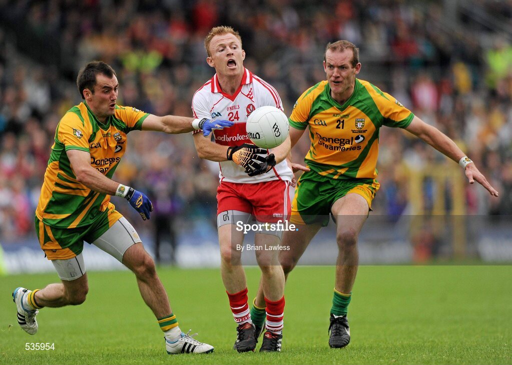 17 July 2011; Martin Donaghy, Derry, in action against Karl Lacey, left, and Neil Gallagher, Donegal. Ulster GAA Football Senior Championship Final, Derry v Donegal, St Tiernach's Park, Clones, Co. Monaghan. Picture credit: Brian Lawless / SPORTSFILE