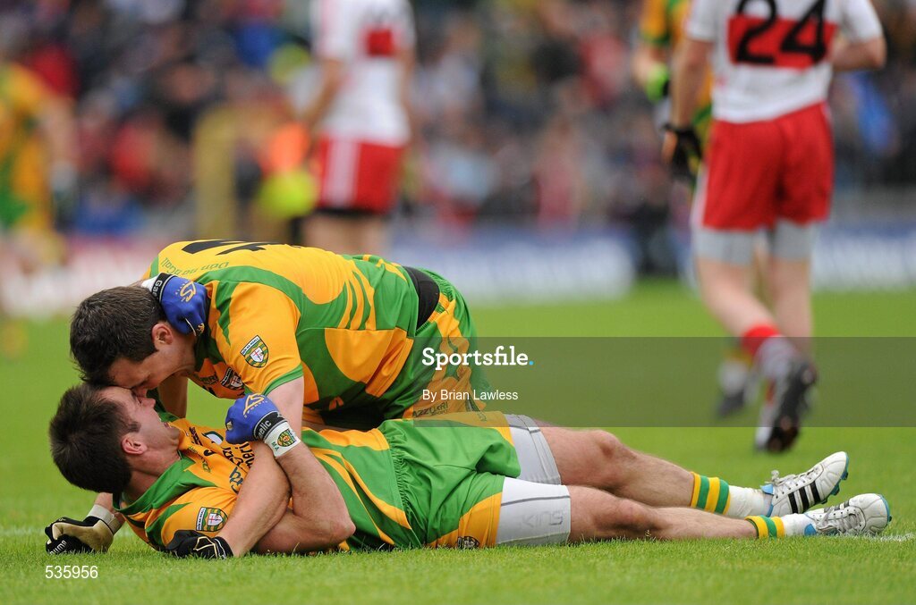 17 July 2011; Donegal captain Michael Murphy, top, celebrates with team-mate Karl Lacey at the final whistle. Ulster GAA Football Senior Championship Final, Derry v Donegal, St Tiernach's Park, Clones, Co. Monaghan. Picture credit: Brian Lawless / SPORTSFILE