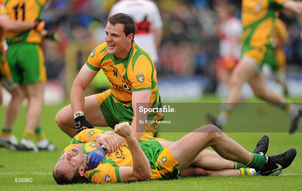 17 July 2011; Donegal captain Michael Murphy celebrates with team-mates Karl Lacey, hidden, and Neil Gallagher at the final whistle. Ulster GAA Football Senior Championship Final, Derry v Donegal, St Tiernach's Park, Clones, Co. Monaghan. Picture credit: Brian Lawless / SPORTSFILE