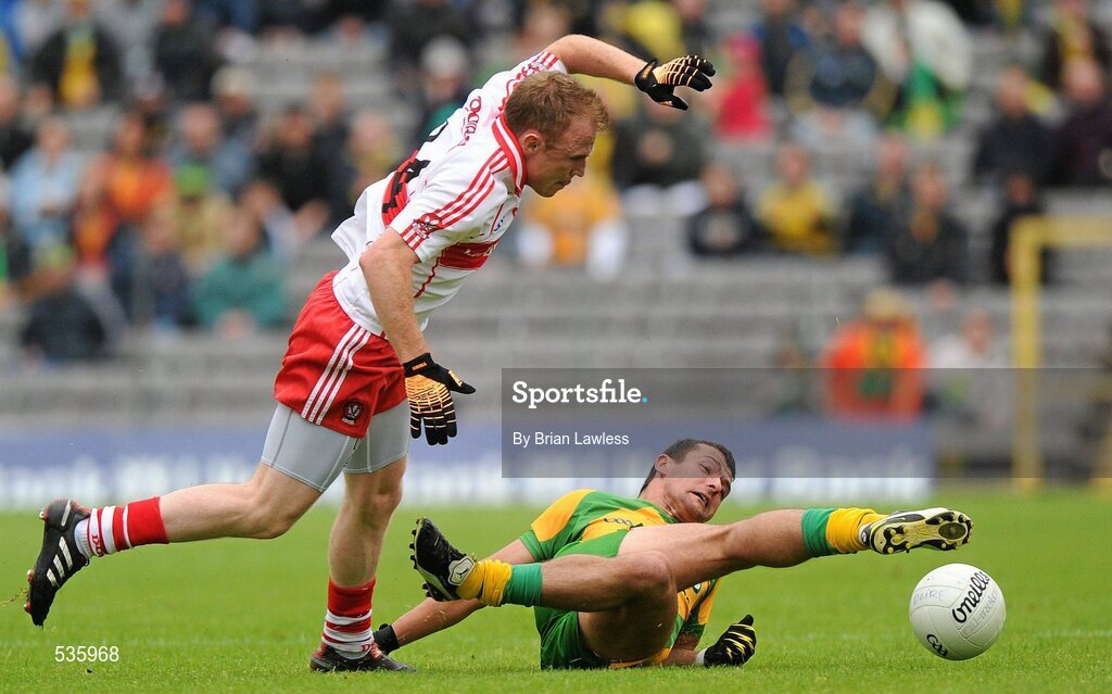 17 July 2011; Frank McGlynn, Donegal, in action against Martin Donaghy, Derry. Ulster GAA Football Senior Championship Final, Derry v Donegal, St Tiernach's Park, Clones, Co. Monaghan. Picture credit: Brian Lawless / SPORTSFILE