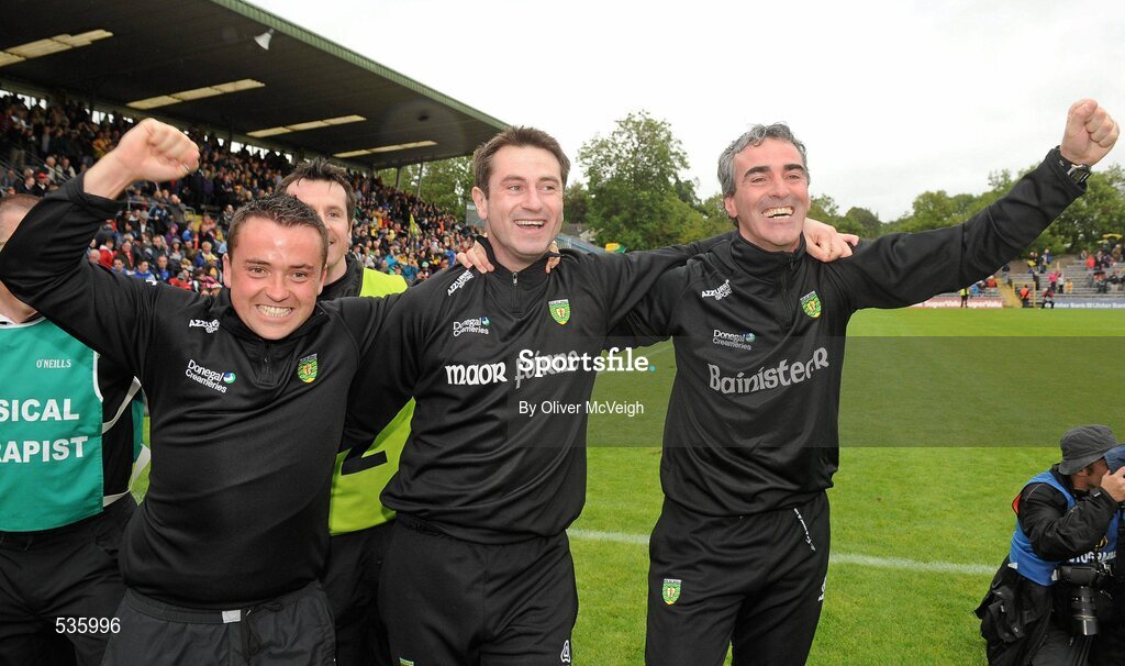 17 July 2011; Donegal manager Jim McGuinness, right, his assistant manager Rory Gallagher and his selector Maxi Curran, left, celebrate at the final whistle. Ulster GAA Football Senior Championship Final, Derry v Donegal, St Tiernach's Park, Clones, Co. Monaghan. Picture credit: Oliver McVeigh / SPORTSFILE