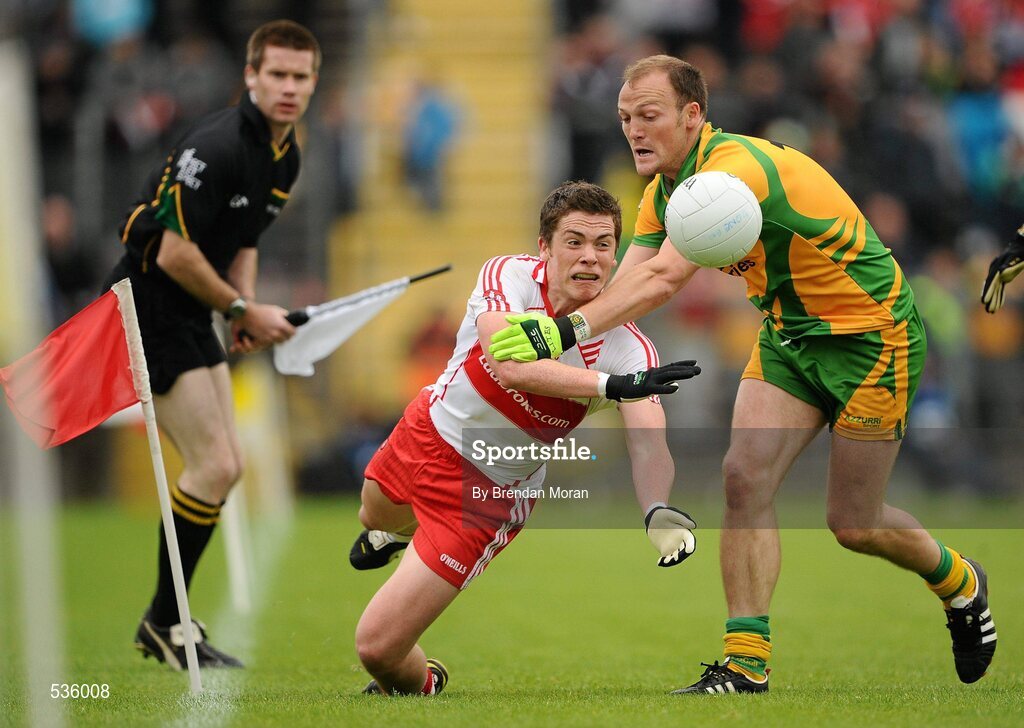 17 July 2011; Dermot McBride, Derry, in action against Colm McFadden, Donegal. Ulster GAA Football Senior Championship Final, Derry v Donegal, St Tiernach's Park, Clones, Co. Monaghan. Picture credit: Brendan Moran / SPORTSFILE