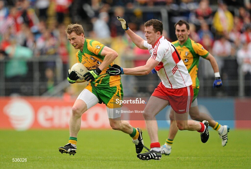17 July 2011; Anthony Thompson, Donegal, in action against Barry McGoldrick, Derry. Ulster GAA Football Senior Championship Final, Derry v Donegal, St Tiernach's Park, Clones, Co. Monaghan. Picture credit: Brendan Moran / SPORTSFILE