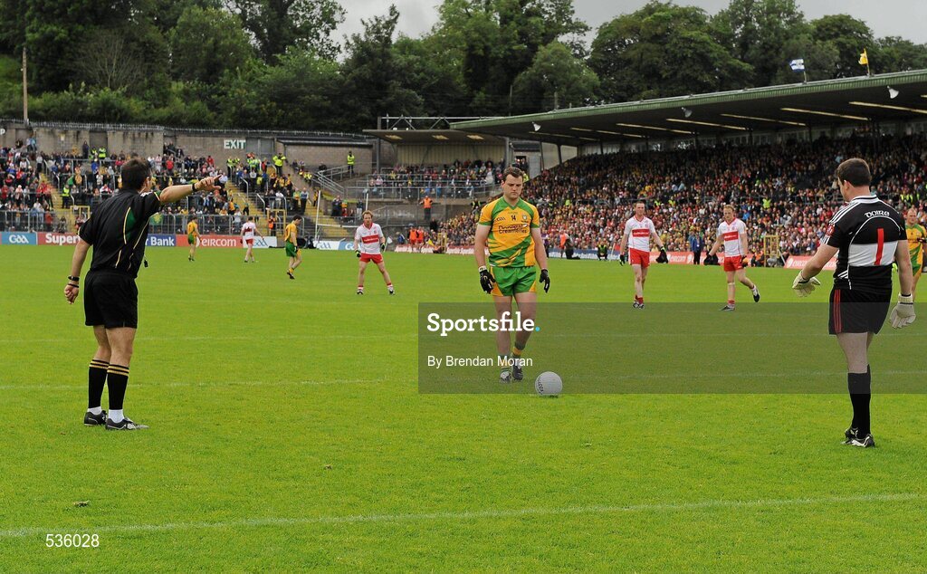 17 July 2011; Referee Maurice Deegan orders Derry goalkeeper Danny Delvin back onto his goal-line as Michael Murphy, Donegal, prepares to take his side's penalty. Ulster GAA Football Senior Championship Final, Derry v Donegal, St Tiernach's Park, Clones, Co. Monaghan. Picture credit: Brendan Moran / SPORTSFILE